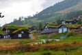 Norwegian grass roof village houses summer rainy day view Royalty Free Stock Photo