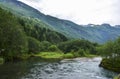 Norwegian landscape with mountain pure cold water river and fjords on background, Norway Royalty Free Stock Photo