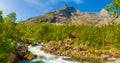 Norwegian landscape with mountain river near Trollstigen, Norway Royalty Free Stock Photo