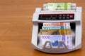 Norwegian money - Krone in a counting machine