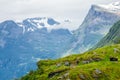 Norwegian mountain village with traditional turf roof houses, Geiranger, Sunnmore region, More og Romsdal county, Norway Royalty Free Stock Photo