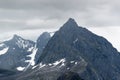 Norwegian mountains with famous Slogen mountain with dark clouds