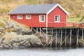 Norwegian old city with reflections in water and cloudy sky, nor Royalty Free Stock Photo