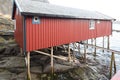 Norwegian old city A with reflections in water and cloudy sky, n Royalty Free Stock Photo