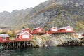 Norwegian old city with reflections in water and cloudy sky, nor Royalty Free Stock Photo