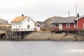 Norwegian old city with reflections in water and cloudy sky, nor Royalty Free Stock Photo