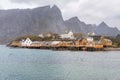 Norwegian old city with reflections in water and cloudy sky, nor Royalty Free Stock Photo