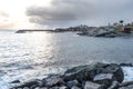 Norwegian old city A with reflections in water and cloudy sky, n Royalty Free Stock Photo