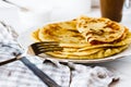 Norwegian potato pancakes Lefse in a white plate on table.