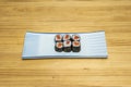 Norwegian salmon hosomaki sushi with rice seasoned with Japanese Royalty Free Stock Photo