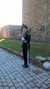 The Norwegian soldier and the old architecture of Oslo. Norway: an old building in a Park next to the Royal Palace in Oslo.