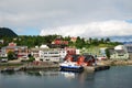 Norwegian town with small wharf by the fjord Royalty Free Stock Photo