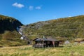 Norwegian traditional black house serpentine road