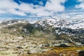 Norwegian tundra landscape with snowy mountains Royalty Free Stock Photo