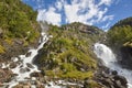 Norwegian twin waterfall. Rocky forest landscape. Latefossen. Vi