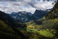 Norwegian valley surrounded by mountains on a summer day Royalty Free Stock Photo