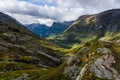 Norwegian valley surrounded by mountains on a summer day