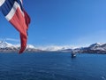 Norwegian Winter: Majestic Mountain Flag in Blue Sky a view from svalbard and jan mayen Royalty Free Stock Photo