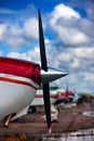 The nose of the aircraft with a propeller on the sky background Royalty Free Stock Photo