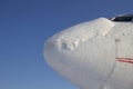 The nose of the airliner is covered with snow Royalty Free Stock Photo
