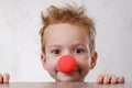 Nose clown background white child. kid circus Royalty Free Stock Photo