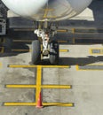 Nosewheel of a parked commercial airliner Royalty Free Stock Photo