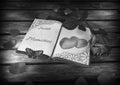 Nostalgia - book, rose and butterflies on wooden Royalty Free Stock Photo