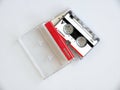 Nostalgia, Isolated, transparent background of Microcassette audio recorder tape in cassette box, analog media device, vintage Royalty Free Stock Photo