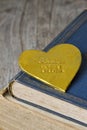 Nostalgic Golden Heart On Old Books