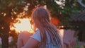 Nostalgic Melancholic Caucasian Teenager Girl Looking at Golden Sunset