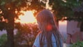 Nostalgic Melancholic Caucasian Teenager Girl Looking at Golden Sunset