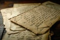 Old letters on the wooden table. Vintage style. Selective focus.
