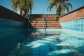 Nostalgic summer start Empty pool, rusty stairs, and tiled floor