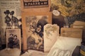 Nostalgic vintage background with feminine accessories advertisement and russian 1900-s newspapers.