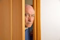 Nosy senior man Royalty Free Stock Photo