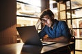 Not again. a handsome young male designer looking stressed while working late in his office. Royalty Free Stock Photo