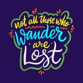 Not All those who wander are lost. Hand drawn vector quote lettering. Motivational typography. Isolated on blue background Royalty Free Stock Photo