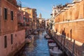 Not ceremonial Venice, narrow canal with boats, Royalty Free Stock Photo