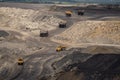 Huge quarry trucks look like toys from above