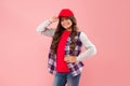 Not stereotypes. Little hipster wear cap pink background. Hipster look of small girl. Happy child in hipster style Royalty Free Stock Photo