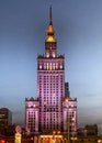 Notable illuminated Palace of Culture and Science high-rise building in Warsaw, Poland at night