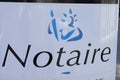 Notaire french office notarial text sign and brand logo on wall facade notary office