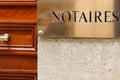 Notaire golden french sign gold logo notary office building wall , notaires means notaries Royalty Free Stock Photo