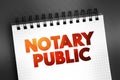 Notary public - public officer constituted by law to serve the public in non-contentious matters, text on notepad, concept