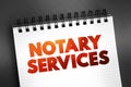 Notary Services text quote on notepad, concept background