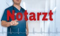 Notarzt in german emergency doctor showing on viewer with hear