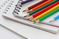 Note book and colored pencils Royalty Free Stock Photo