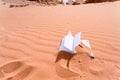 Note book in red sand dune of desert Royalty Free Stock Photo