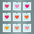 Note cards with painted hearts on wall