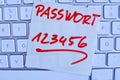 Note on computer keyboard: password 123456 Royalty Free Stock Photo